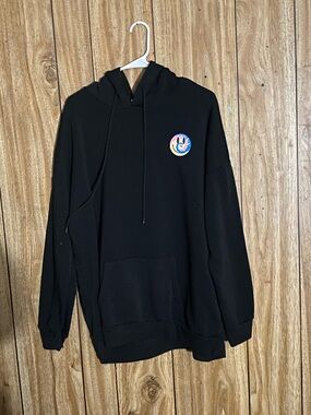 Stellah Black Men's Hoodie with Small Multicolor Patch